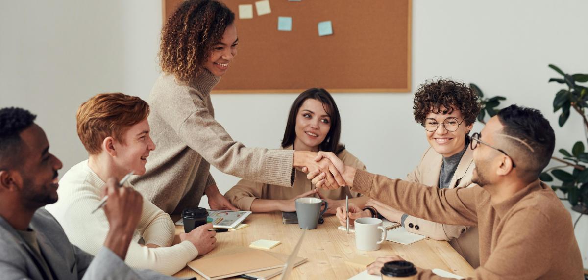 Colleagues shaking each other's hands